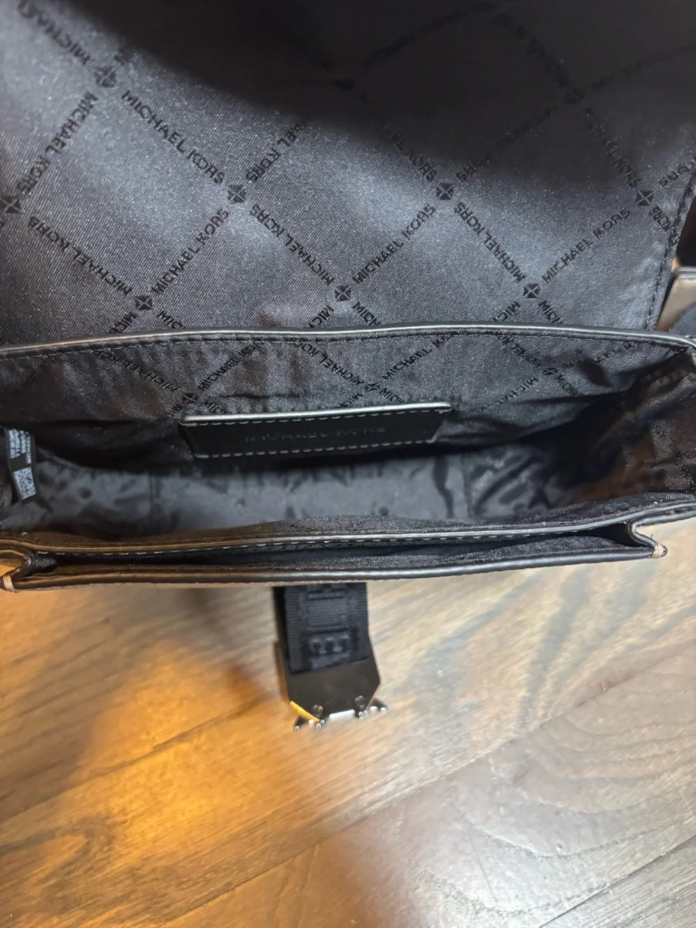 Michael Kors Beige Leather Messenger with Black Strap. NWOT